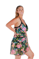 Model wearing floral and black printed long mesh wrap skirt swim cover up 