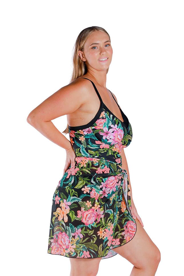 Model wearing floral and black printed long mesh wrap skirt swim cover up 