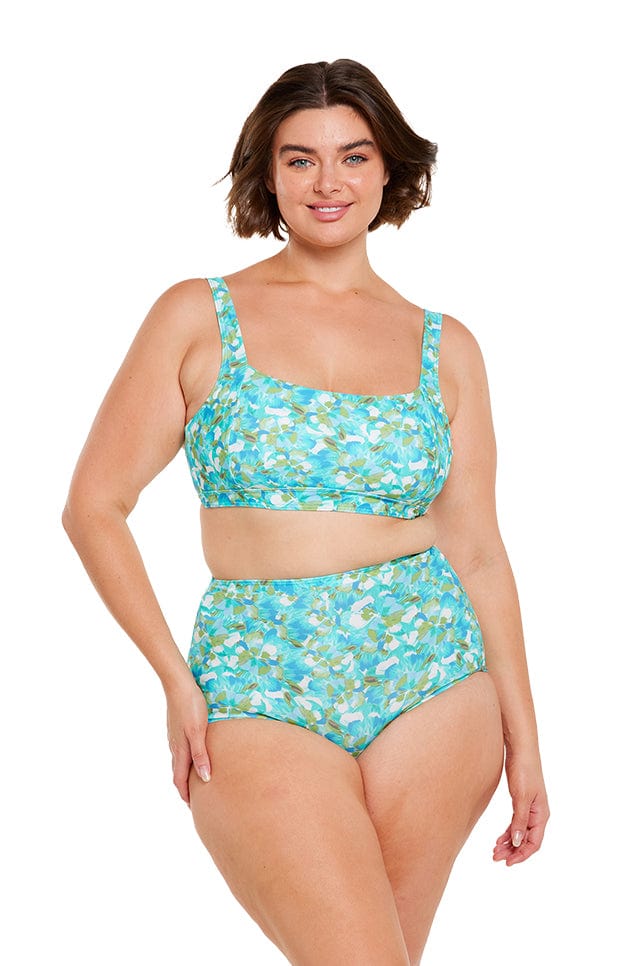 Brunette plus size women wears ladies high waisted bikini bottom