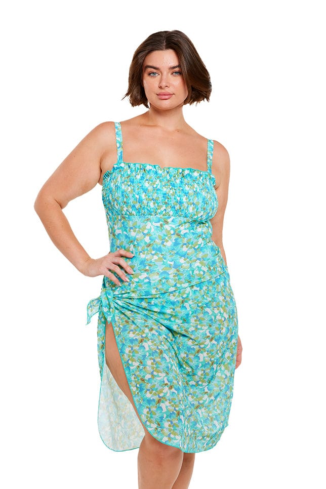 Brunette model wears blue plus size mesh wrap long sarong