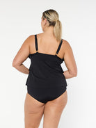 Model wearing chlorine resistant black tankini top