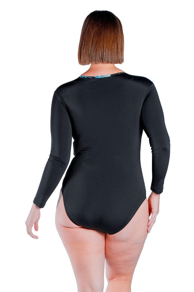 back profile of model wearing long sleeve chlorine resistant long sleeve one piece swimsuit with black and floral front panel detail