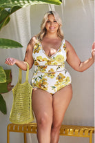 Blonde model holding citrus coloured woven tote bag on her arm