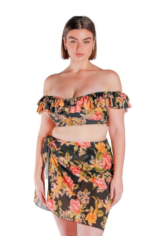 Model wearing a black floral mesh wrap skirt