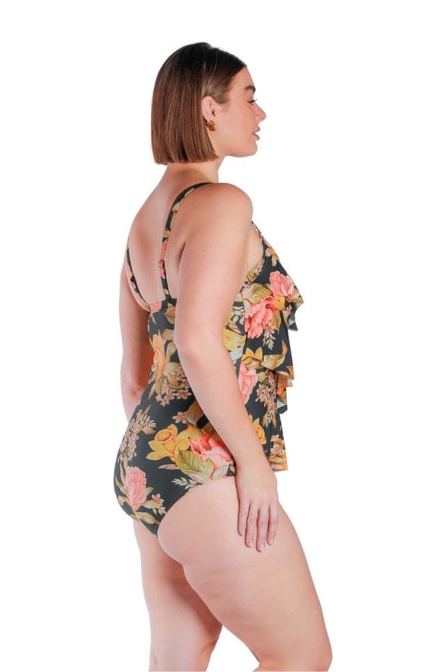 side profile of model wearing yellow, orange and black printed 3 tier one piece