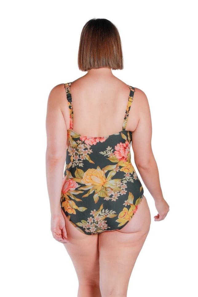 Model wearing floral and black printed V neck one piece