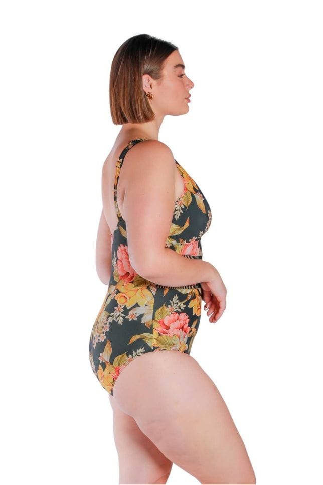 Model wearing floral and black printed V neck one piece