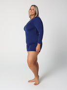 Person wearing a blue outfit on a white background