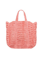 Large woven beach bag in peach colour