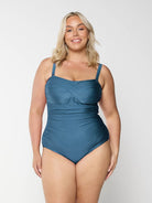 model wearing grey women's one piece