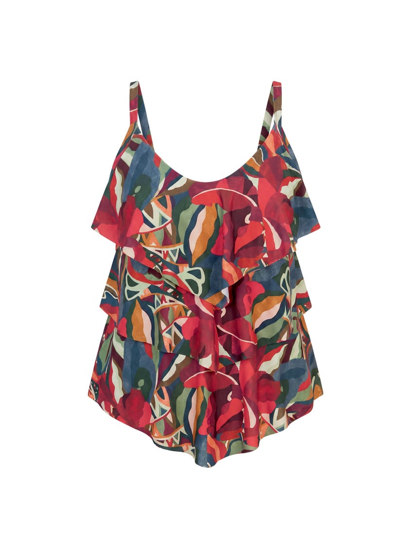 A sleeveless ruffled tankini top with a vibrant abstract floral print in red, green, blue, and beige, displayed against a solid white background.