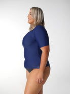 Model showing side of navy short sleeve rashie