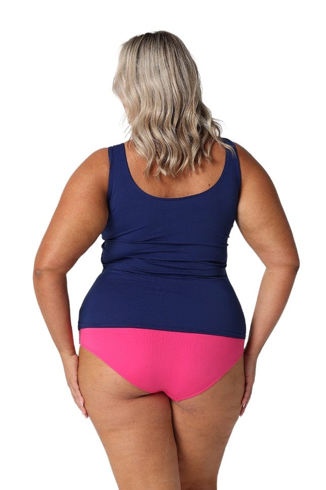 Model showing back of womens navy tankini top and pink bottoms