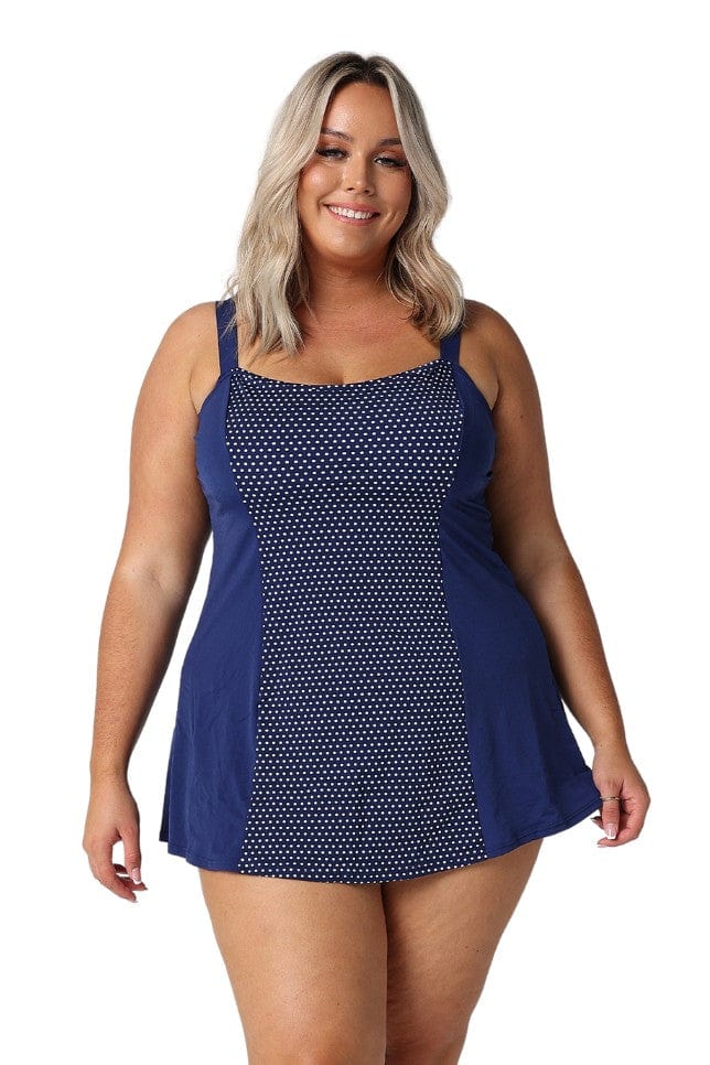 Model wearing navy and white dots womens swim dress