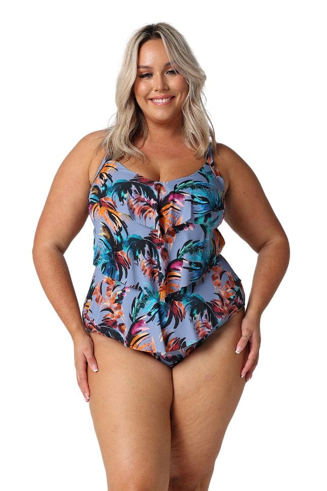 Model wearing tropical print 3 tier one piece