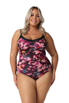 Model wearing pink and plum floral underwire one piece swimsuit
