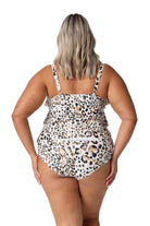 Model showing back of leopard print tankini and matching pant