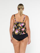 Blonde model shows the back of pink and gold floral chlorine resistant tankini top with adjustable straps