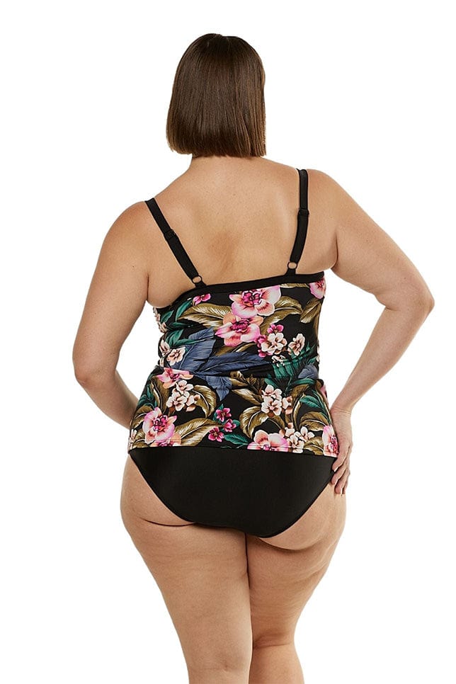 back view of model wearing black floral tankini swim top