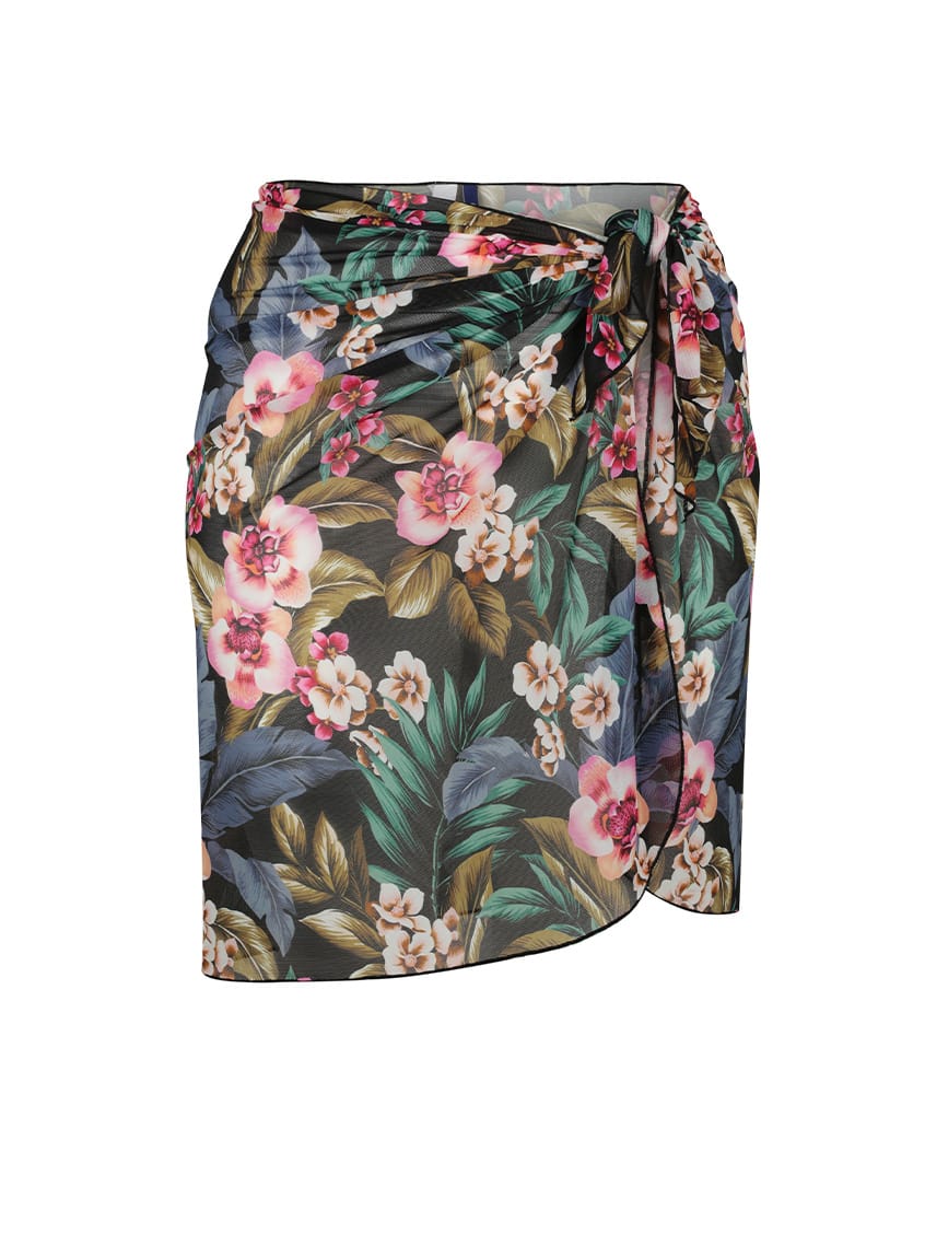 A wrap-style skirt with a dark green base and a vibrant tropical floral print featuring pink, white, and red flowers with green and brown leaves, shown against a plain white background.