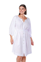 model wearing cheesecloth white dress