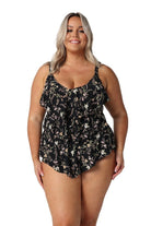Model wearing black floral 3 tier tankini top
