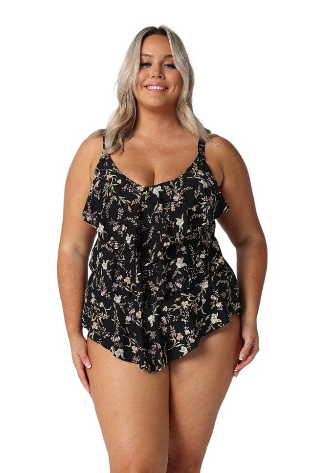 Model wearing black floral 3 tier tankini top