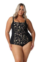Model wearing black floral womens swim tankini top