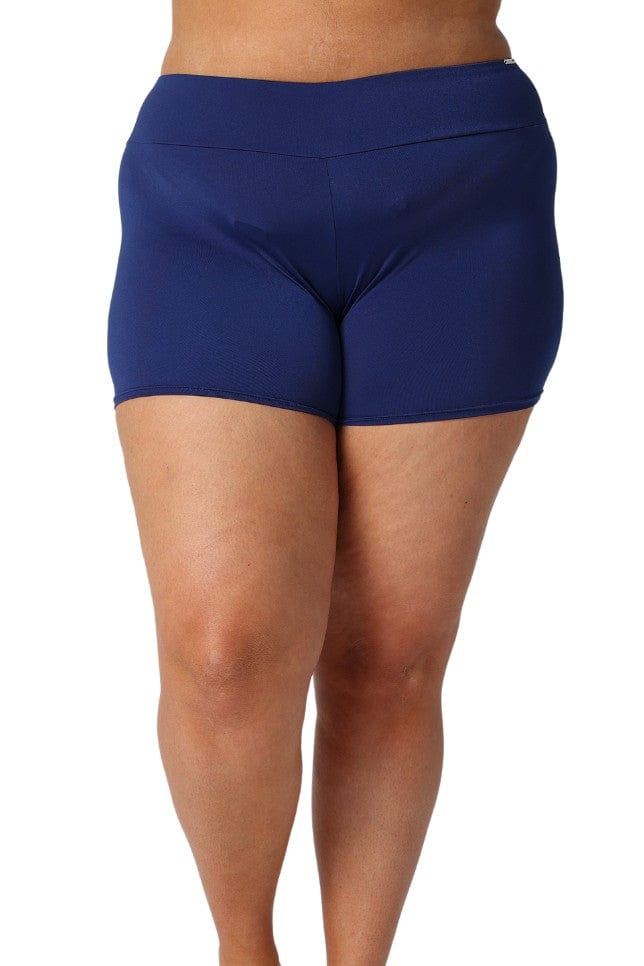 Model wearing navy boyleg swim pant
