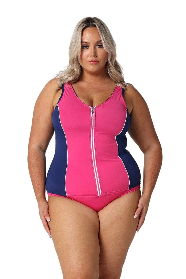 Model wearing pink and navy zip front tankini top