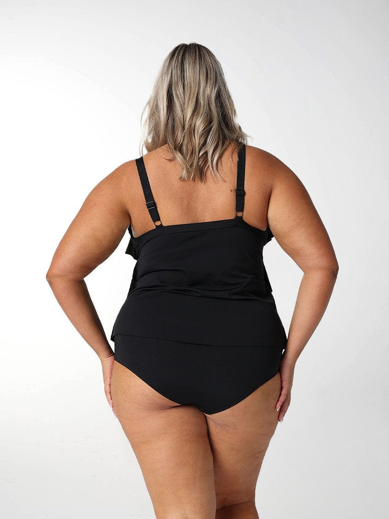 Model wearing chlorine resistant black tankini top