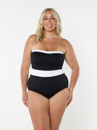 model wearing black and white strapless one piece