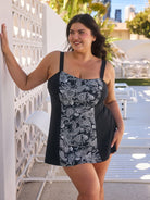 model wearing mono paisley women's swim dress