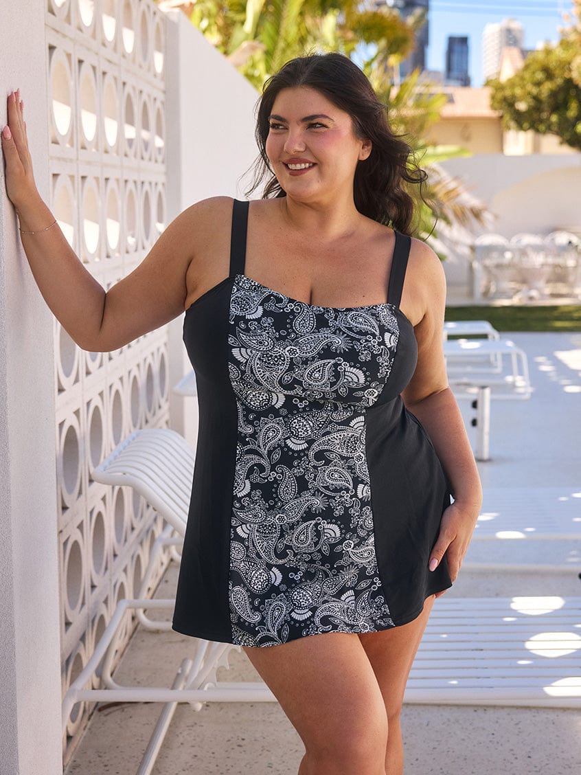 model wearing mono paisley women's swim dress