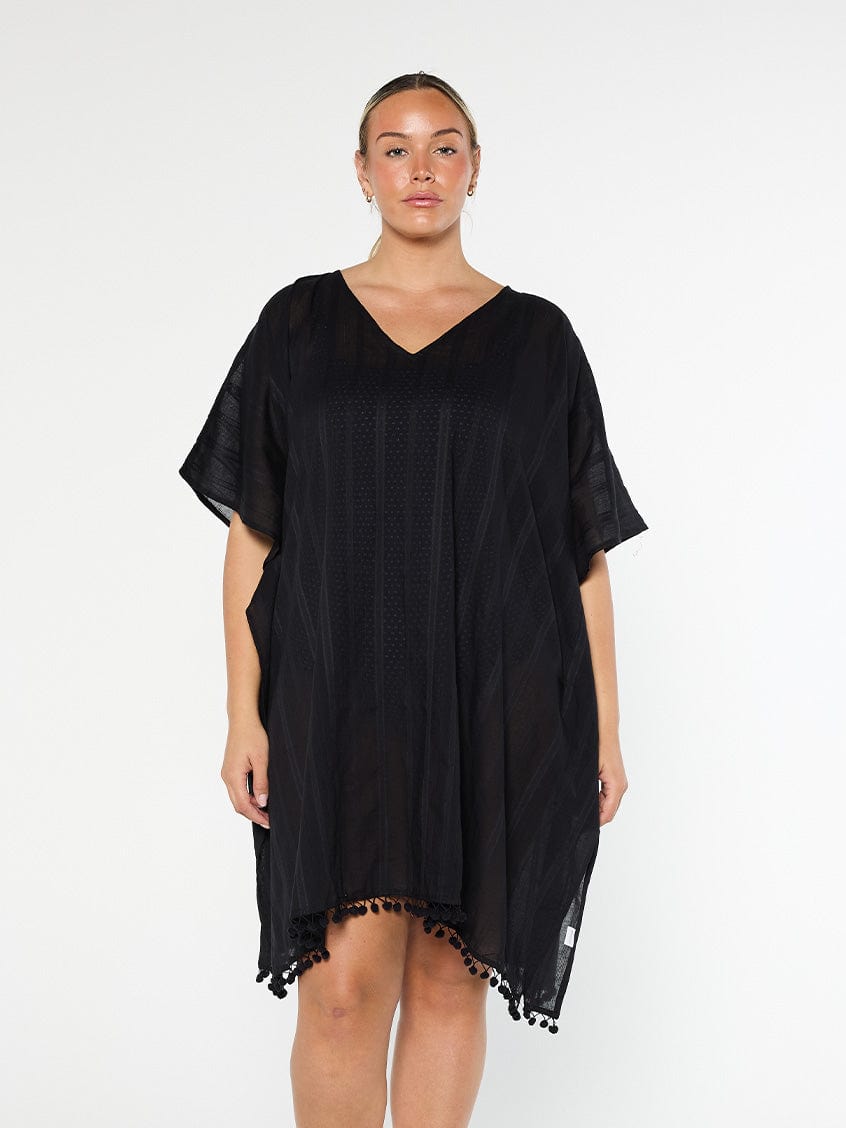 model wearing black cotton kaftan