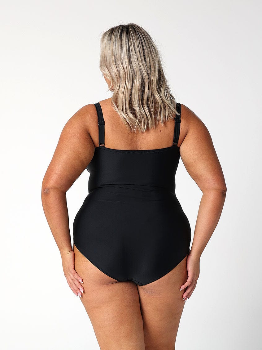 model showing back of black one piece
