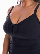 close up of honey comb texture on black boyleg one piece