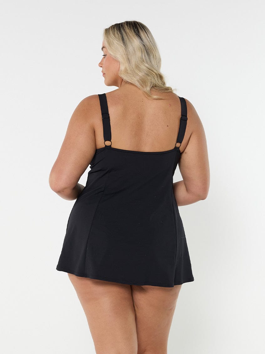 model showing back of black and white paisley print swim dress