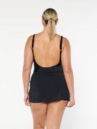 model showing back of black mesh skirt 