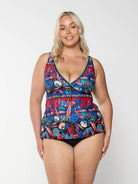 model wearing bright floral v neck tankini