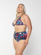 model showing side of bright multi-coloured bikini