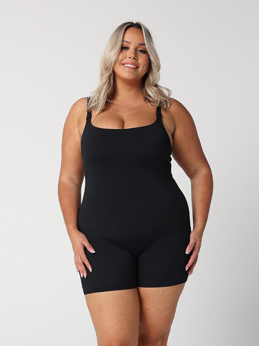 model wearing black boyleg one piece