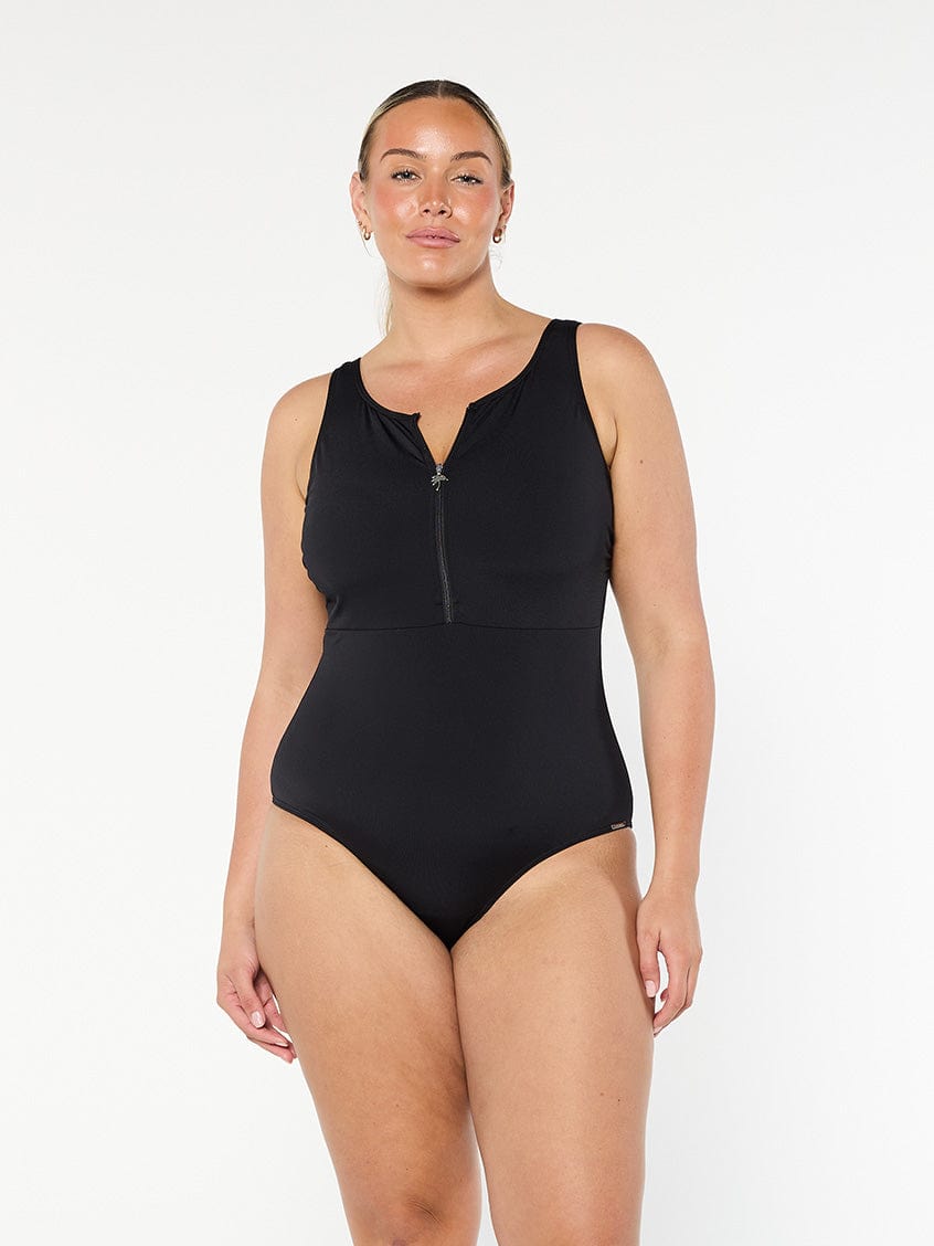 model wearing black sleeves women's one piece