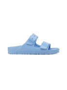 Light blue sandal with double straps on a white background