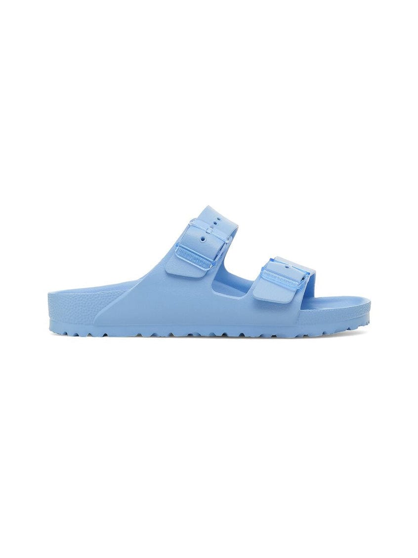 Light blue sandal with double straps on a white background