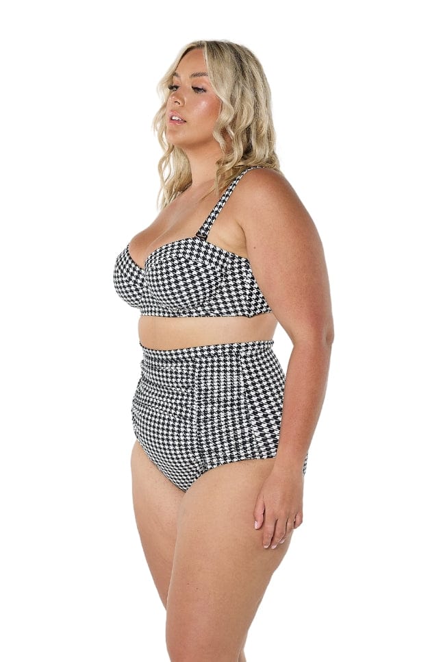 model wearing black and white print retro bikini