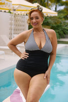 model wearing hounds tooth halter one piece