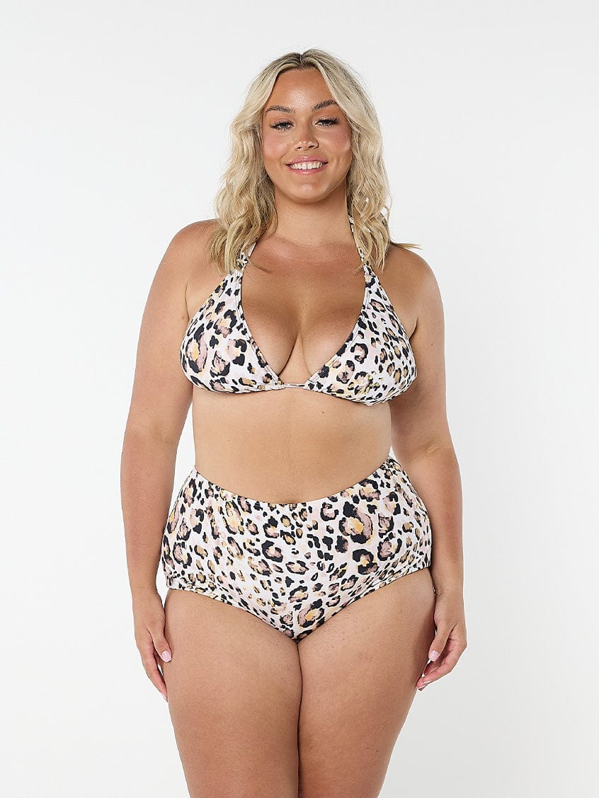 Woman wearing a leopard print bikini set