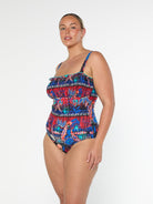model showing side of vibrant women's one piece
