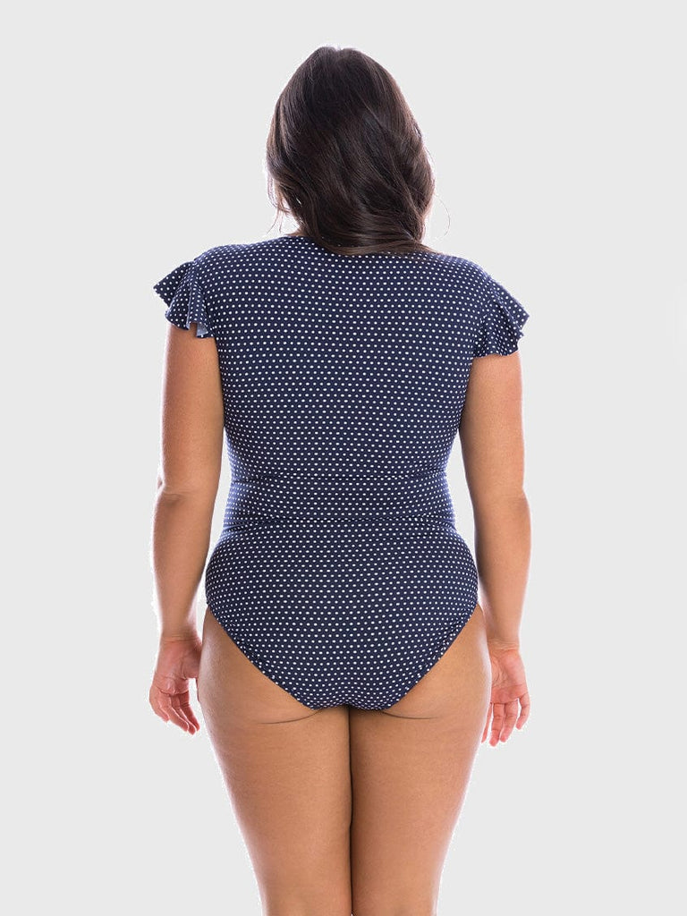 model showing back of navy and white dots frill sleeve swimsuit
